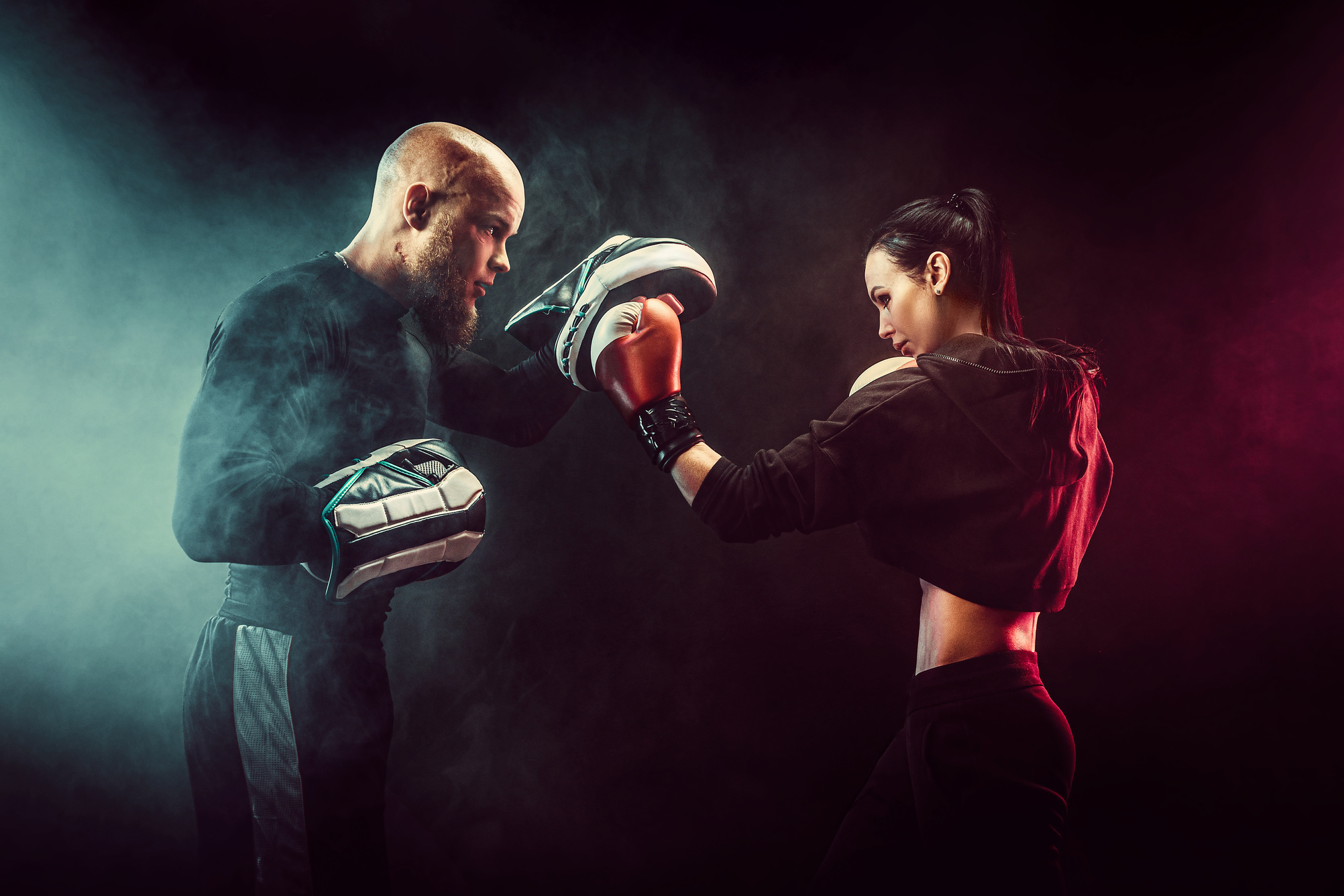 Woman Trains with Boxing Trainer